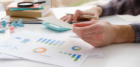 Young business man inspector in financial report.の写真素材