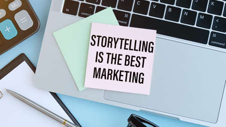Storytelling is the best Marketing - written on a notebook with a pen.の写真素材