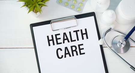 Word, writing Self Care. Business concept for Taking caring for own Health written on book note paper on wooden background.の写真素材