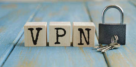 Wooden cubes with acronym VPN on gray stone table.の写真素材
