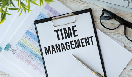Time Management text on paper which pen and glasses, business conceptual.