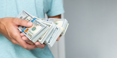 Man of hundred dollar bills close up. Stock market financial illegal freedom exchange earn pile rich...