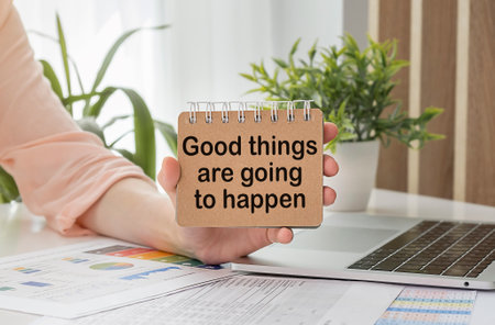 Good Things Are Going To Happen Inspirational message written on vintage wooden board. Motivation concept image.の写真素材