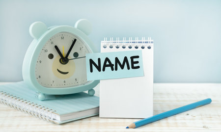 Paper stickers with text name on wooden background. Business Conceptの写真素材