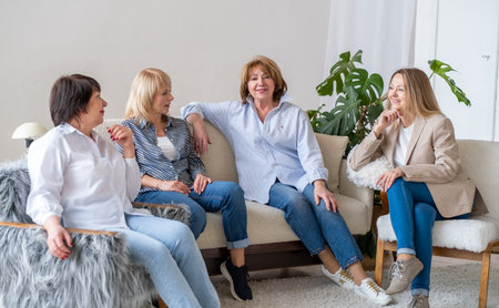 A meeting of older women for joint communication, meetings after a pandemic, friends communicate at home.の写真素材
