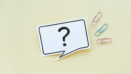 Question Mark speech bubble isolated on yellow background.