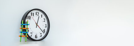 Mechanical clock close-up on a light white background. Exact time. Space for text. Copy space