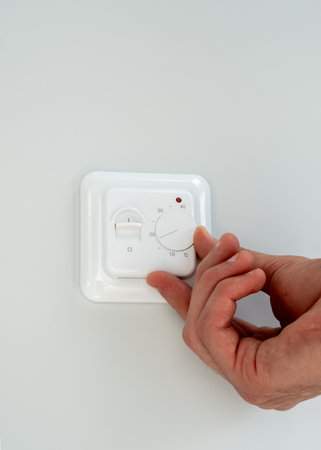 One hand adjust thermostat digital in celsius at home