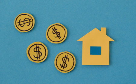 planning savings money of coins to buy a home, concept for property ladder, mortgage and real estate investment. for saving or investment for a houseの写真素材