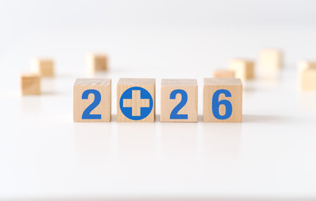 A wooden block with the numbers 2, 2, 2, and 2 on it. The blocks are arranged in a way that they...