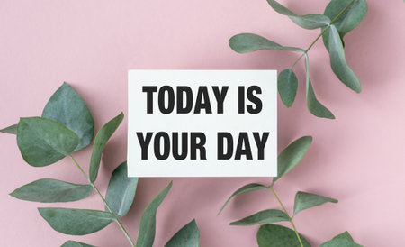 A white sign with green leaves on it that says Today is your Day. The image has a positive and...