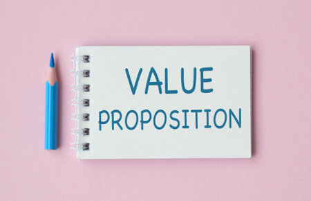 A pencil is on a piece of paper with the word Value Proposition written on it. The pencil is blueの写真素材
