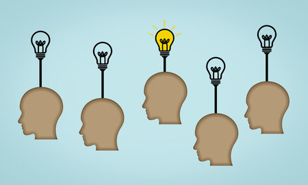 Unique idea. Concept of glowing light bulb from human head figure on blue background.の写真素材