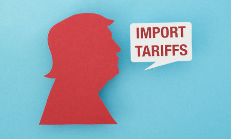 Import Tariffs text and a paper cutout of a head on a blue background