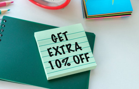 Get Extra 10 percent Off text on sticky note for sale and marketing promotion.