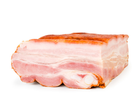 Piece of lard close up on white background.の写真素材