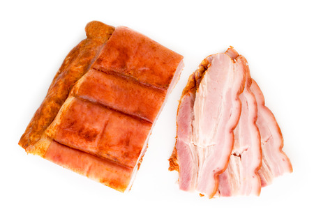 Piece of bacon and sliced bacon top view.の写真素材