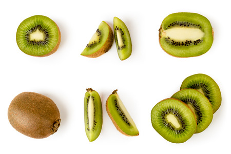 Set of ripe kiwis, halves and pieces in different angles on a white. The view from the top.の写真素材