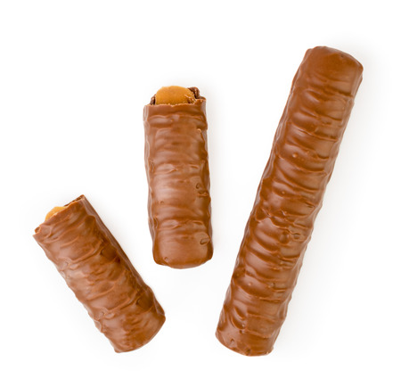 The chocolate stick and two halves on a white. The form of the top.の写真素材