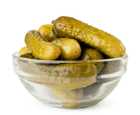 Pickled cucumbers in a glass plate on a white background. Isolatedの写真素材