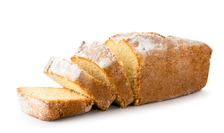 Cheesecake in powdered sugar on a white, isolated.の写真素材