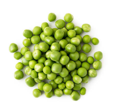Pile of green peas on a white background. Isolated.の写真素材