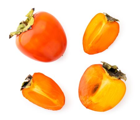 Set of ripe persimmon, half and slices on a white background. The view of the top.の写真素材