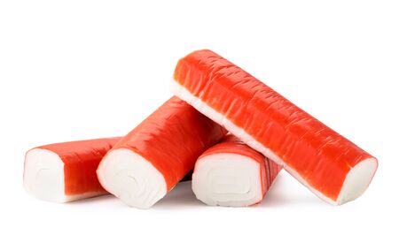 Pile of crab sticks close-up on a white background. Isolated.の写真素材