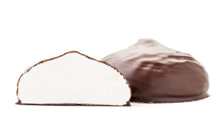 Marshmallow in chocolate with half close-up on a white background. Isolatedの写真素材