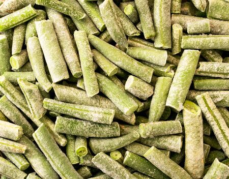 Background of green bean slices top view, close-upの写真素材