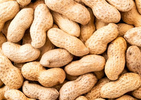 Peanuts in a shell close-up. The view from the top. Peanuts background