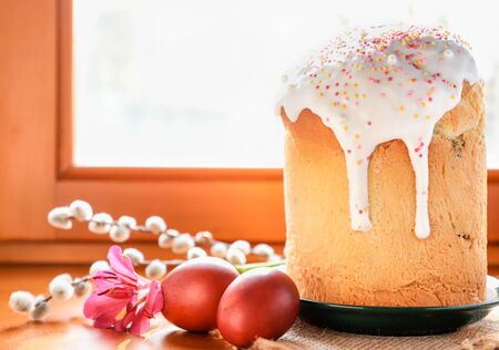 Easter cake with eggs, willow and flower. Easter background