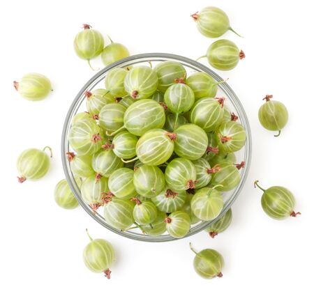 Fresh green gooseberries in a glass plate close-up on a white background, isolated. The view from topの写真素材