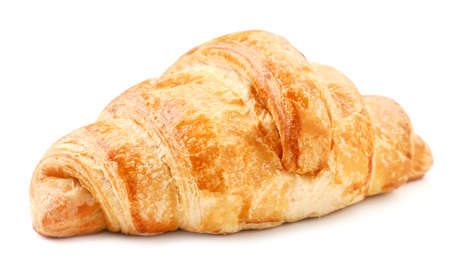 Fresh croissant close-up on a white plate. Isolatedの写真素材