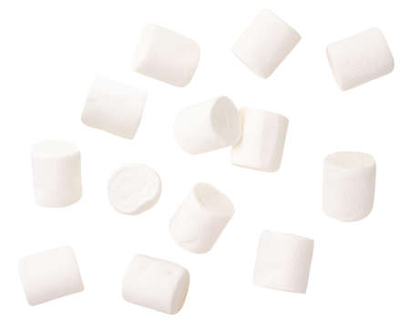 Chewing marshmallow close-up flies on a white background. Isolated