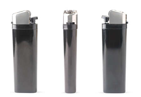 Set of black lighters close-up on a white. Isolatedの写真素材
