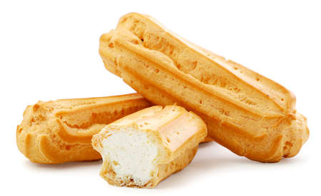 Eclairs whole and half close-up on a white background. Isolatedの写真素材