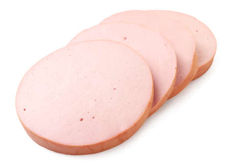 Boiled sausage cut into pieces close-up on a white background. Isolatedの写真素材