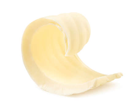 Curl of butter close-up on a white background. Isolatedの写真素材