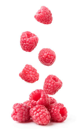 Ripe strawberry falls on a heap close-up on a white background. Isolated