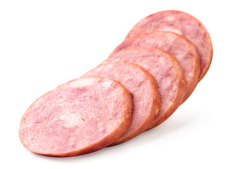 Sausage slices in a row close-up on a white background. Isolatedの写真素材