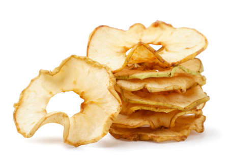 Apple chips heap close-up on a white background. Isolatedの写真素材