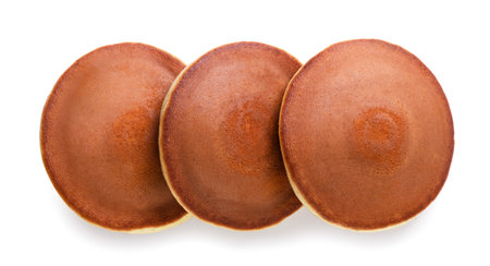 Three pancakes close-up on a white background. top viewの写真素材