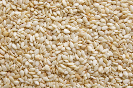 Sesame grains close-up, background. top view