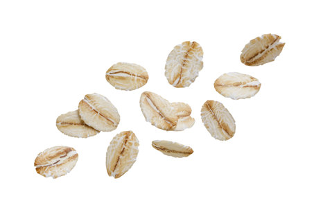 Oat flakes fly close-up on a white background. isolated