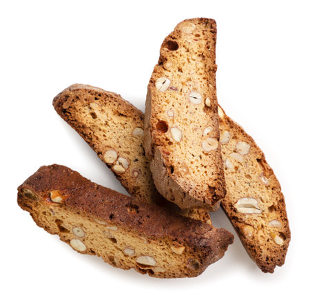 Heap of cantucci biscuits close-up on a white background. top viewの写真素材