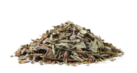 A pile of dried tarragon close-up on a white background. Isolatedの写真素材