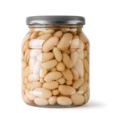 Beans in a glass jar close-up on a white background. Isolatedの写真素材