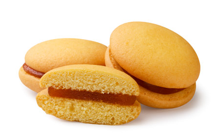 Round sandwich cookies and half close-up on a white background. Isolatedの写真素材