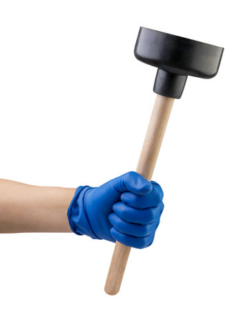 Hand holding plunger close-up on a white background. Isolatedの写真素材